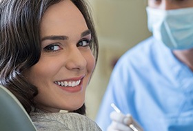 Smiling woman in dental chair