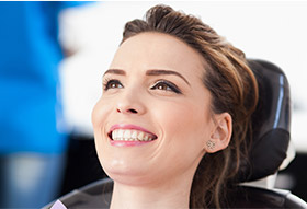 Smiling woman in dental chair