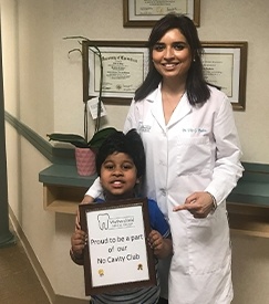 Dentist with young patient