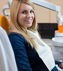 Smiling woman in dental chair