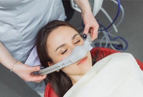 Relaxed patient under the influence of nitrous oxide sedation dentistry