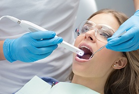 Dentist capturing intraoral images