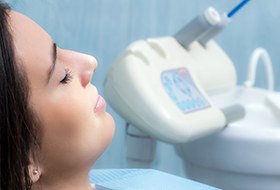 Relaxed woman in dental chair