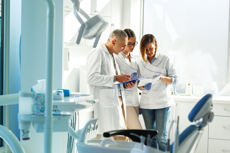 A team of dentists at a multi-specialty practice