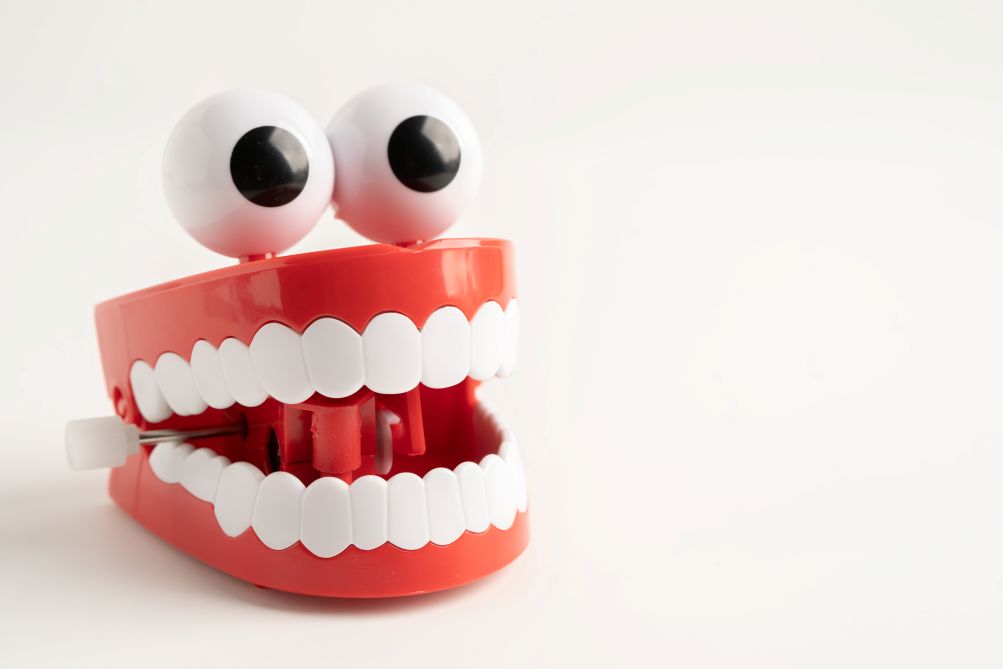 A pair of fake teeth with big eyes