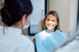 Woman smiling at her dental checkup